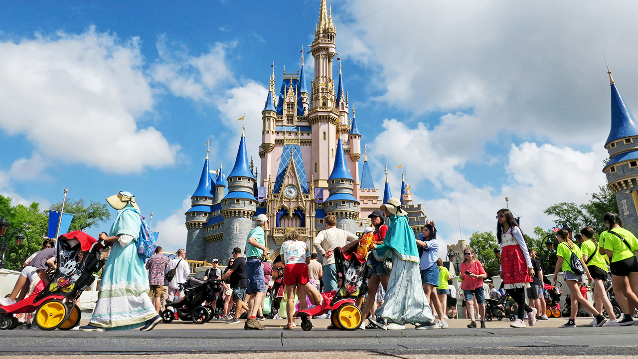 US-NEWS-DISNEYWORLD-RESORT-DEATHS-OS Guests walk past Cinderella Castle at the Magic Kingdom in Walt Disney World on April 2, 2025, in Lake Buena Vista, Florida. (Joe Burbank/Orlando Sentinel/Tribune News Service via Getty Images)